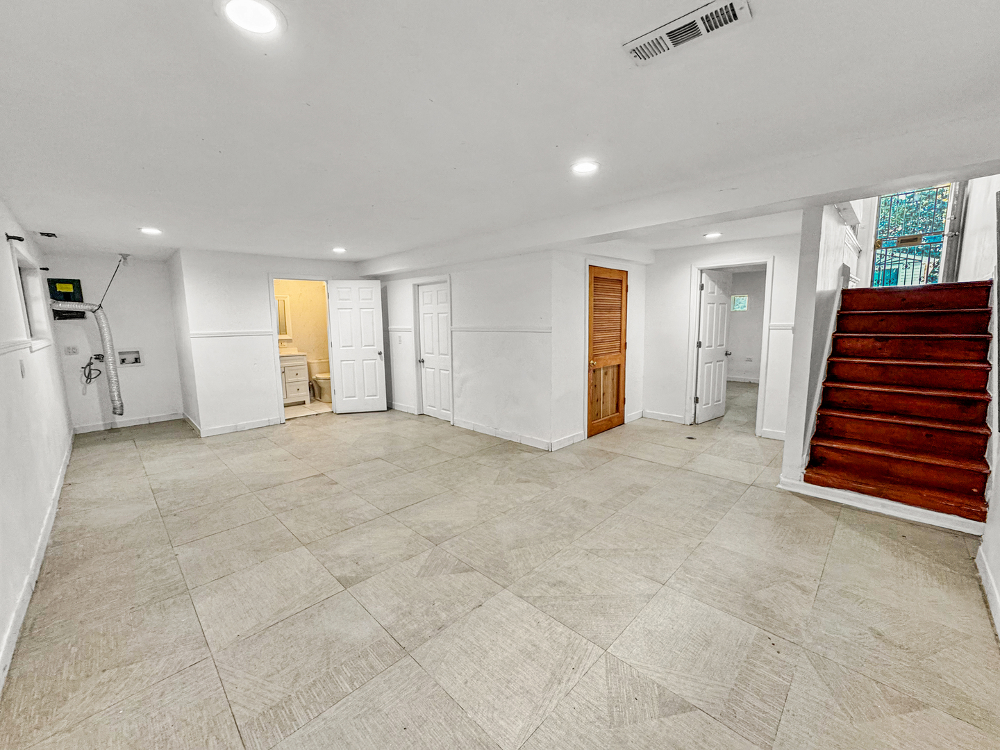 13059 Honore Street Blue Island, IL 60406 - Photo 12 of 15 a view of empty room with a kitchen and a window