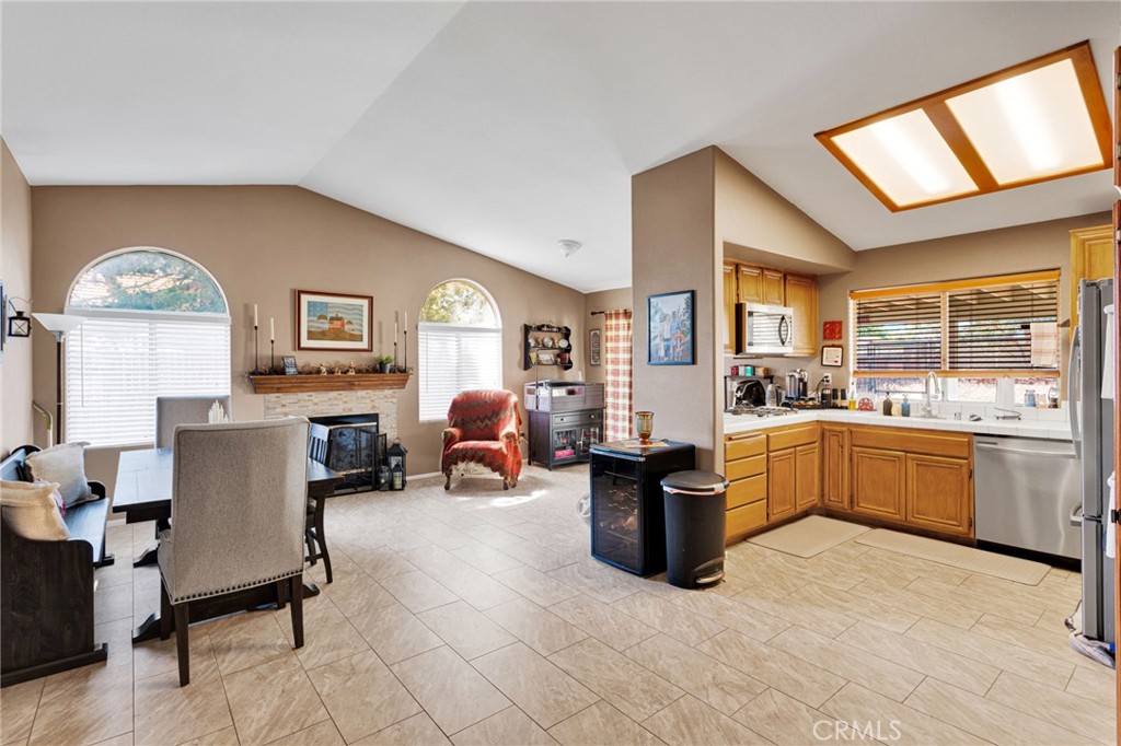 20403 Ochoa Road Apple Valley, CA 92307 - Photo 20 of 48 a kitchen with sink cabinets and outdoor view