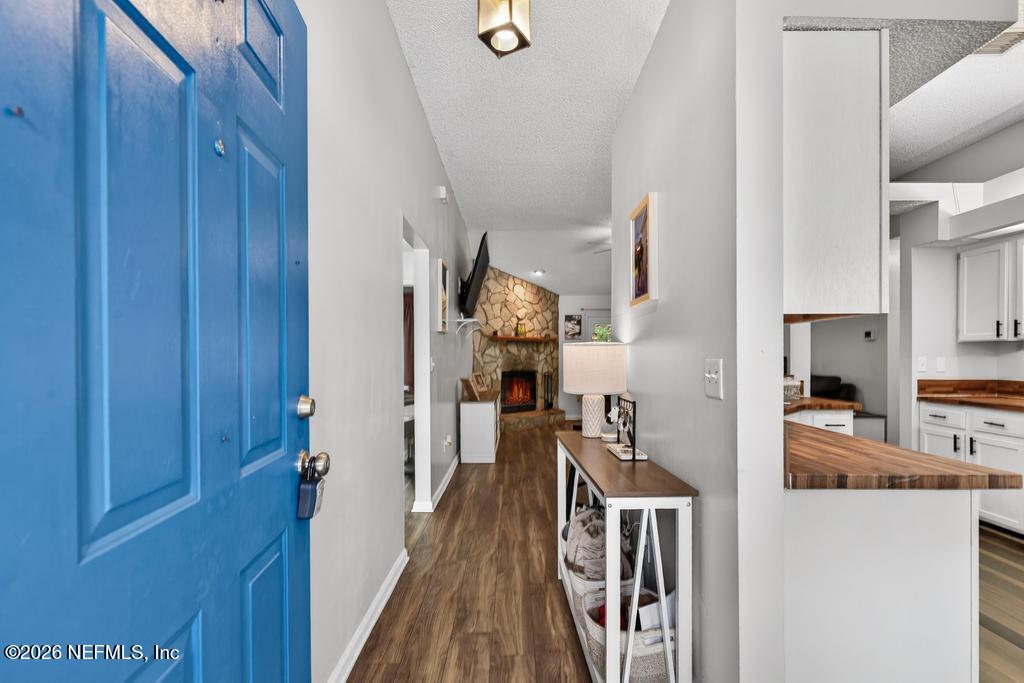 86093 Santa Barbara Street Yulee, FL 32097 - Photo 12 of 51 a view of a kitchen from the hallway