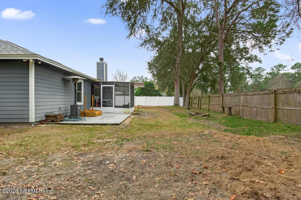86093 Santa Barbara Street Yulee, FL 32097 - Photo 50 of 51 a view of back yard of the house