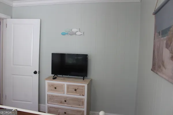 a room with flat screen tv