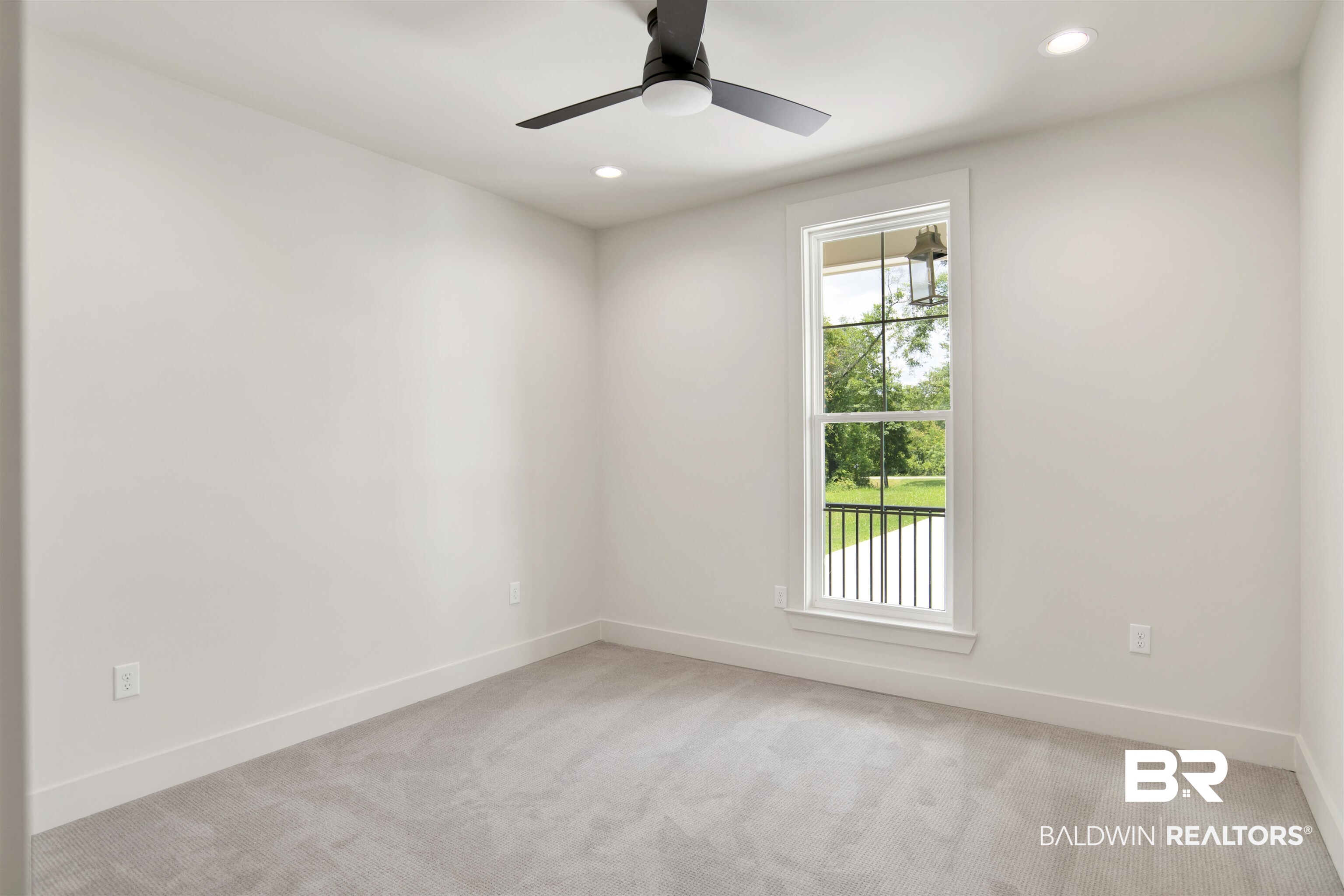 9275 Clarke Ridge Road Foley, AL 36535 - Photo 34 of 43 Unfurnished room with light colored carpet, recessed lighting, baseboards, and ceiling fan
