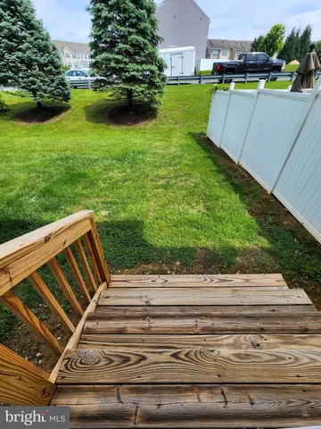 a view of a backyard with a garden