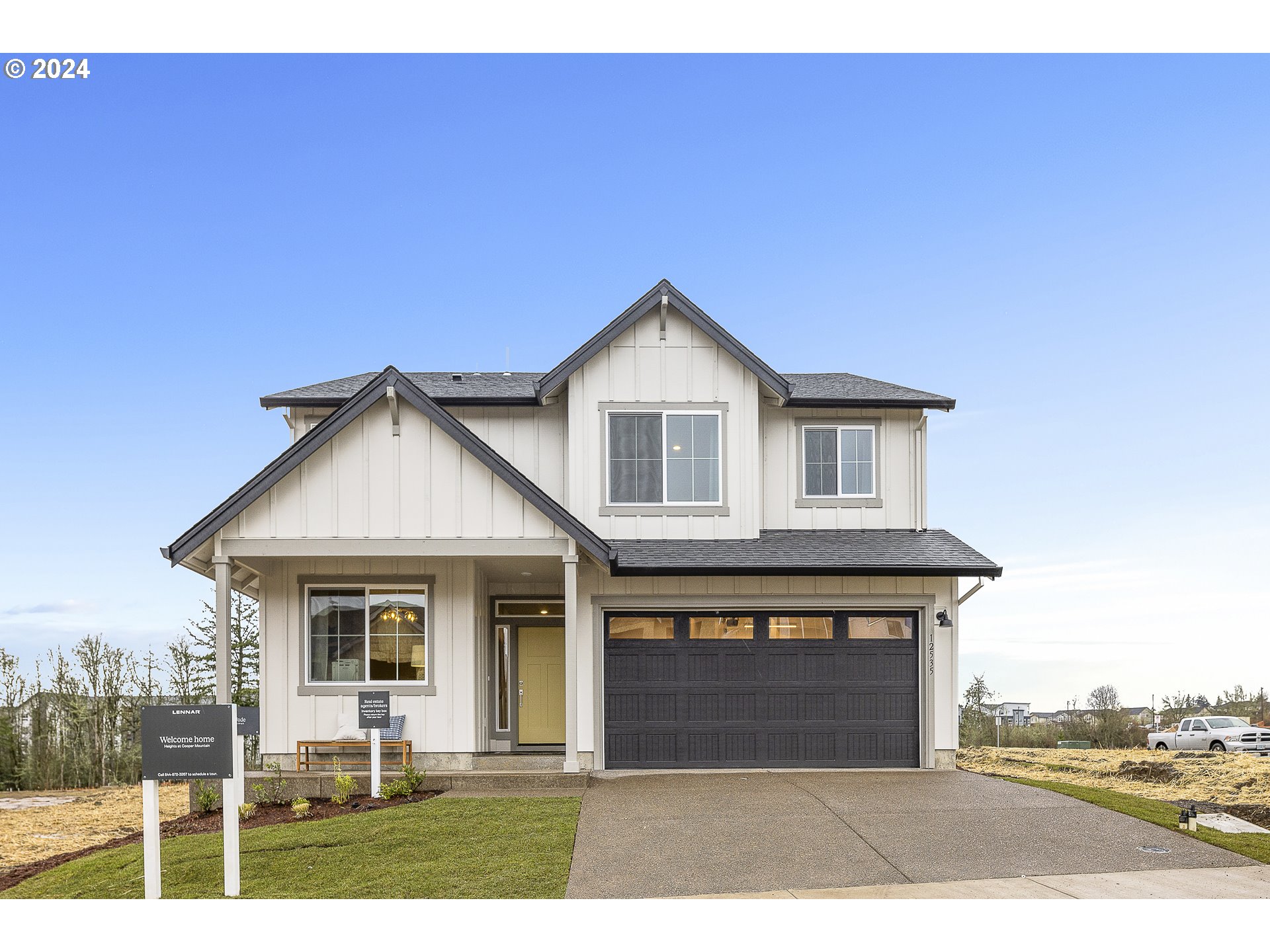 12535 Southwest Lapwing Terrace Beaverton, OR 97007 - Photo 1 of 29 a front view of a house with a yard