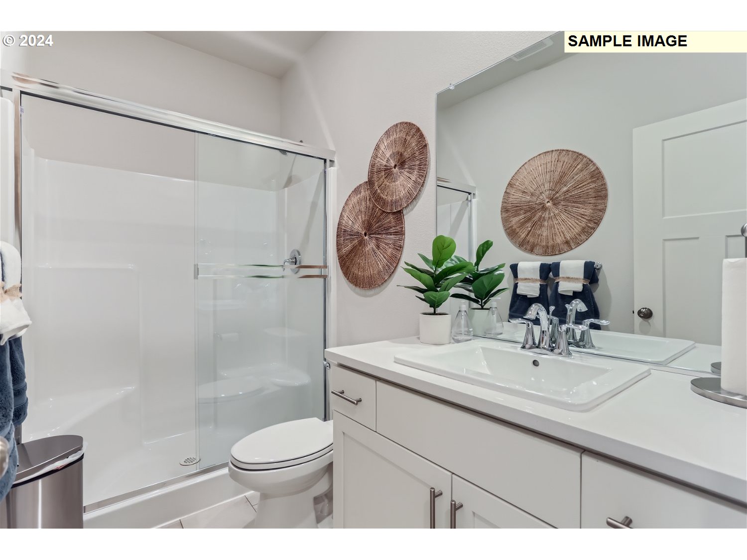 12535 Southwest Lapwing Terrace Beaverton, OR 97007 - Photo 12 of 29 a bathroom with a toilet a sink and a mirror
