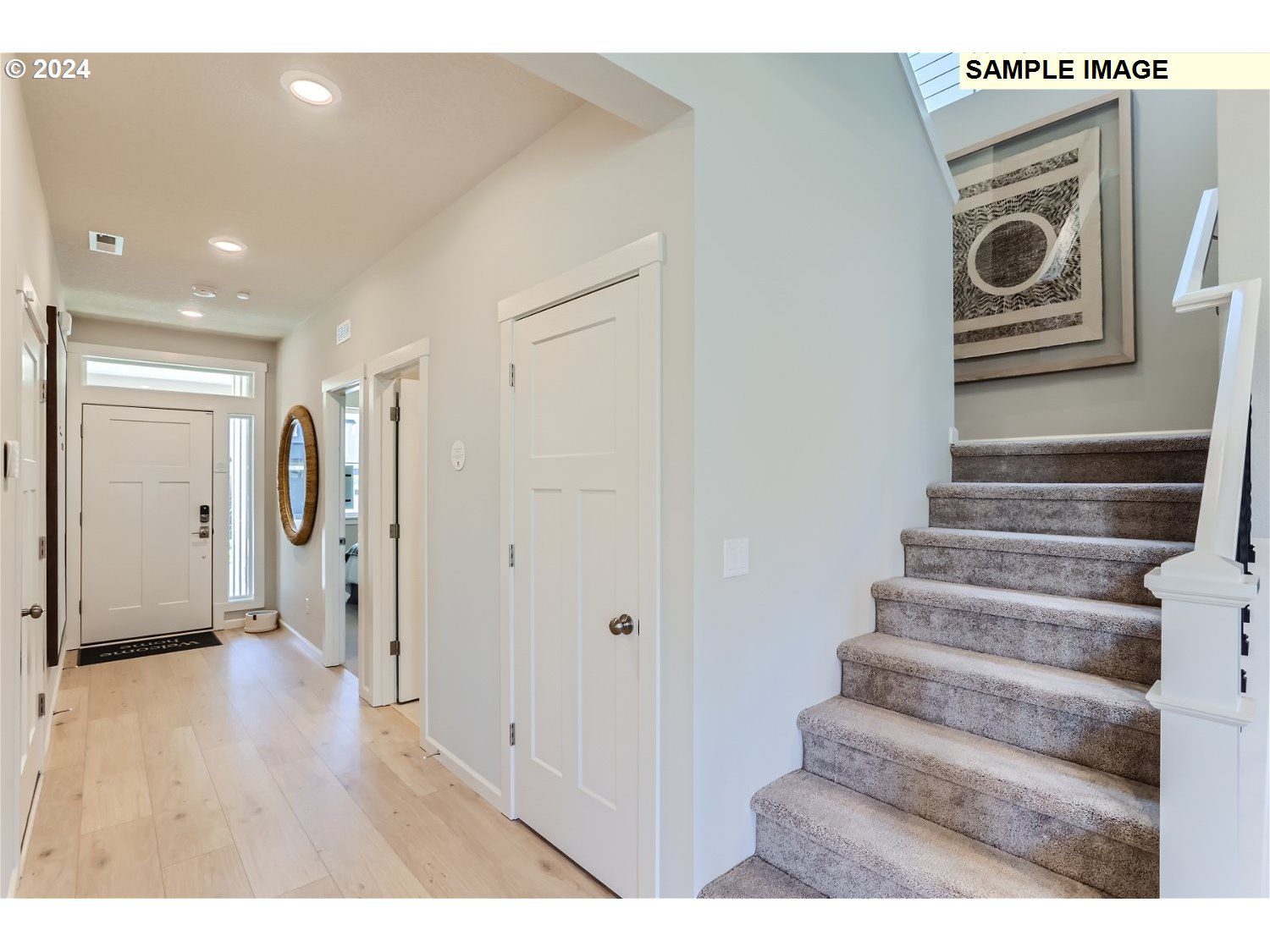 12535 Southwest Lapwing Terrace Beaverton, OR 97007 - Photo 3 of 29 a view of an entryway with wooden floor