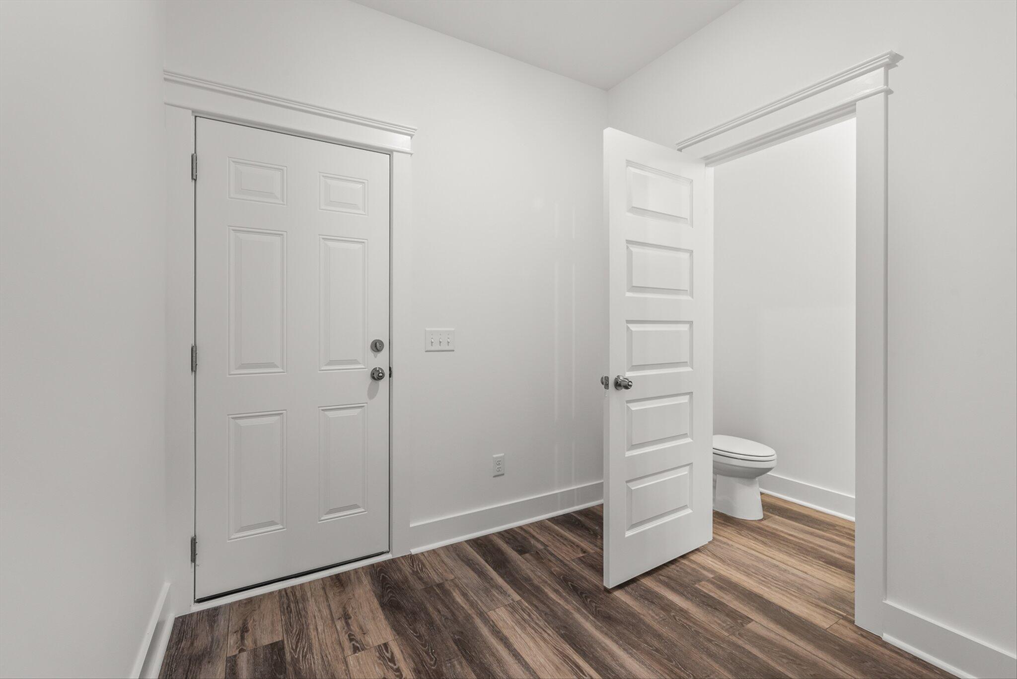 303 Blue Oak Drive Moncks Corner, SC 29461 - Photo 16 of 35 Garage Entry/Half Bath