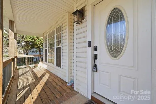 a view of a entryway with wooden floor