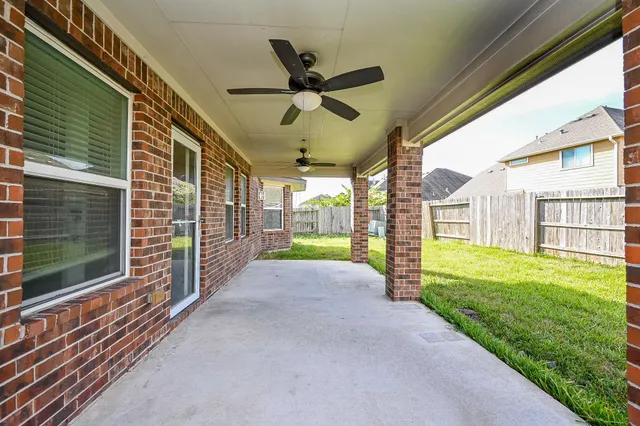 a view of a porch with a backyard