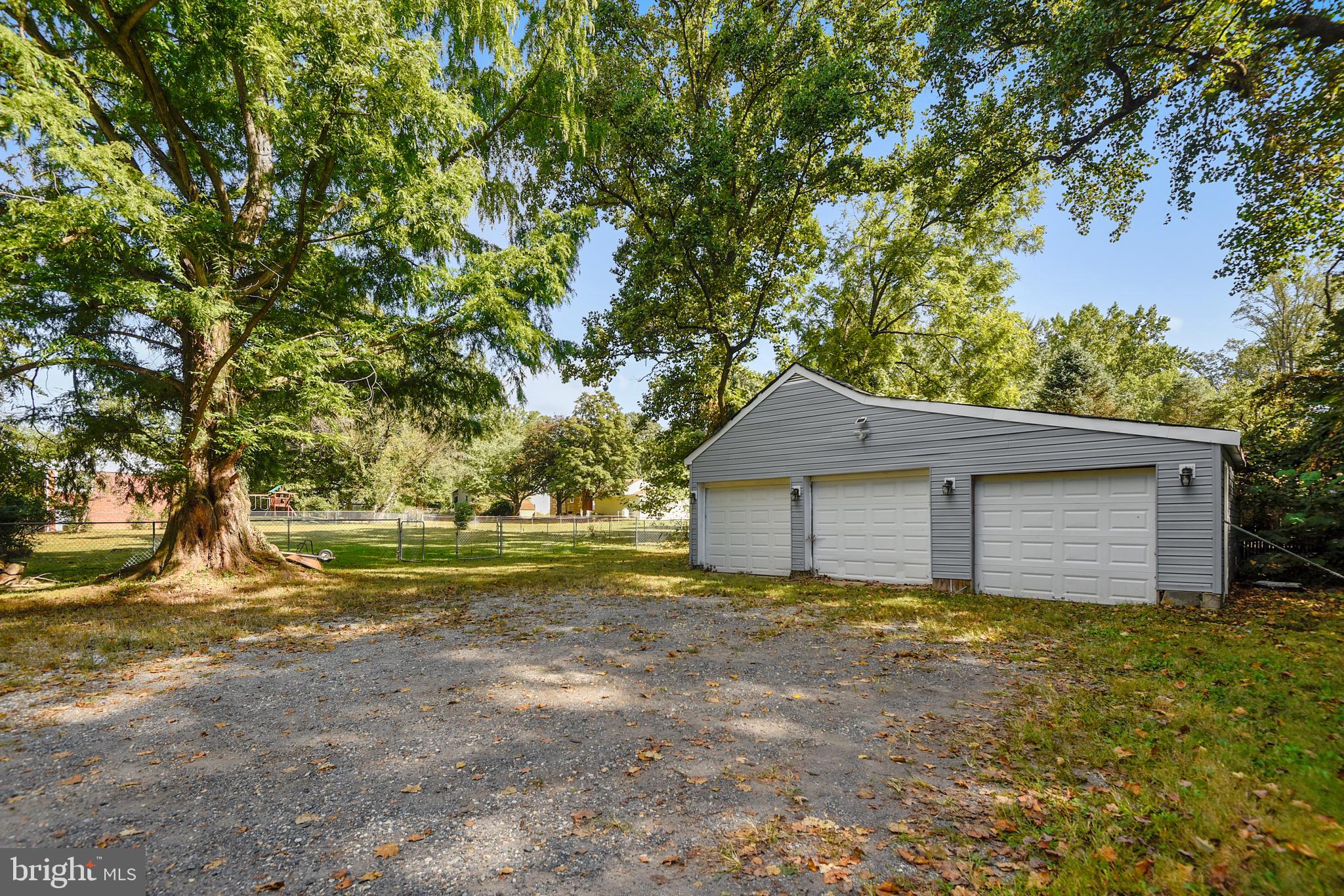 6501 Highbridge Road Bowie, MD 20720 - Photo 32 of 33 Separate three car garage and plenty of parking!