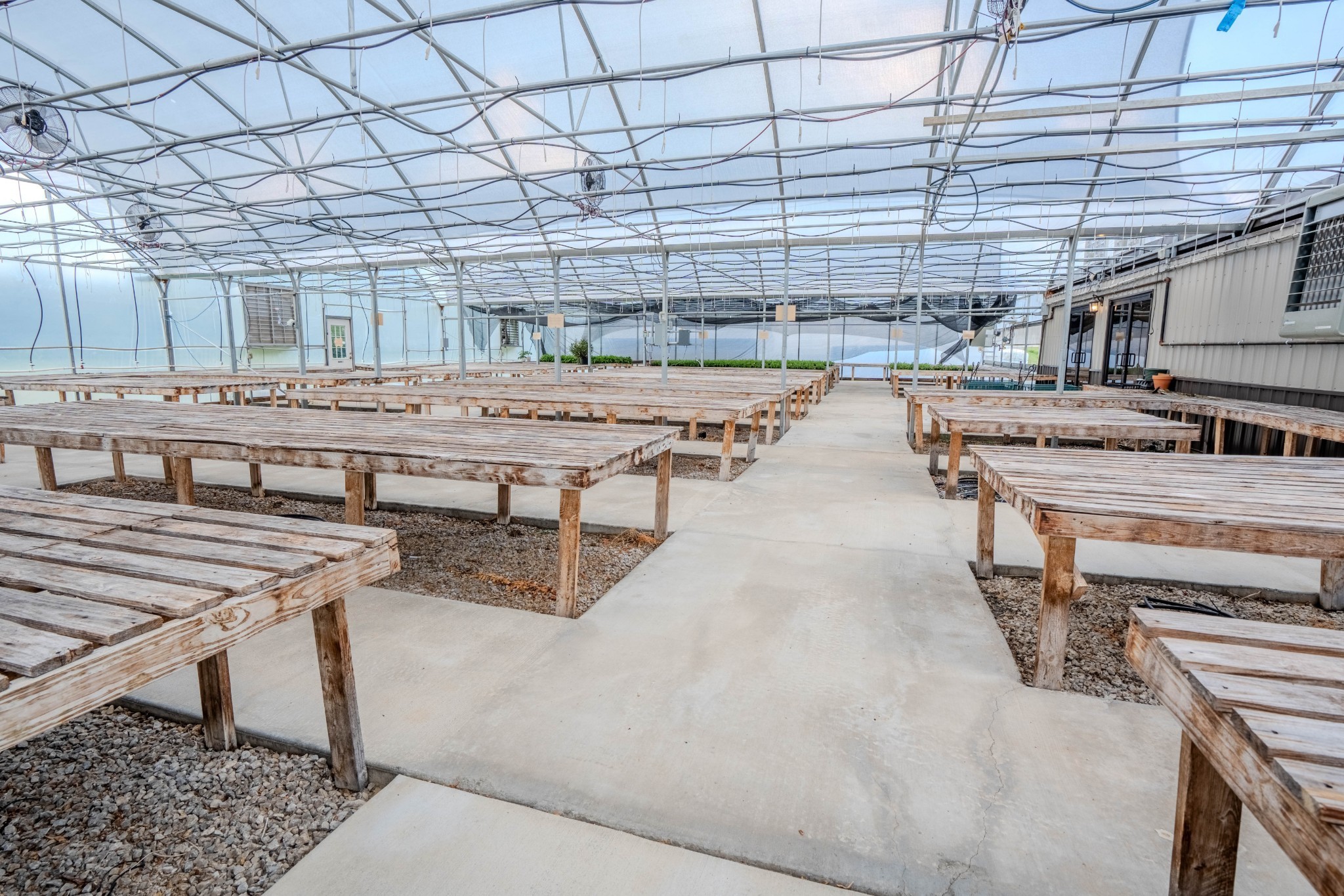 2461 Bodenham Road Pulaski, TN 38478 - Photo 12 of 59 a dining hall with stainless steel appliances kitchen island granite countertop a stove and white cabinets
