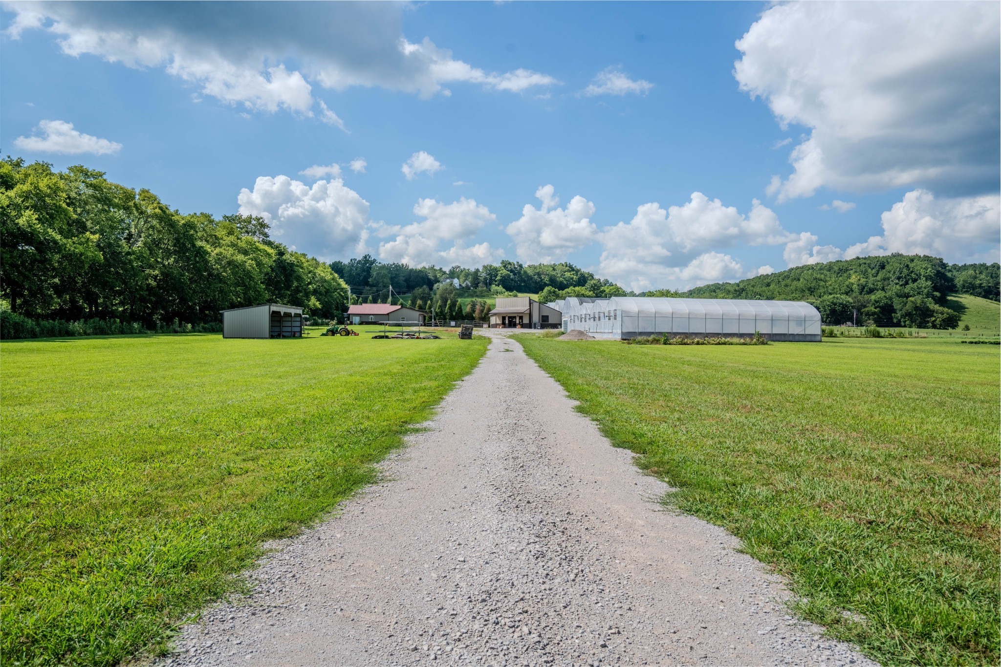 2461 Bodenham Road Pulaski, TN 38478 - Photo 27 of 59 a view of a fountain in front of the house