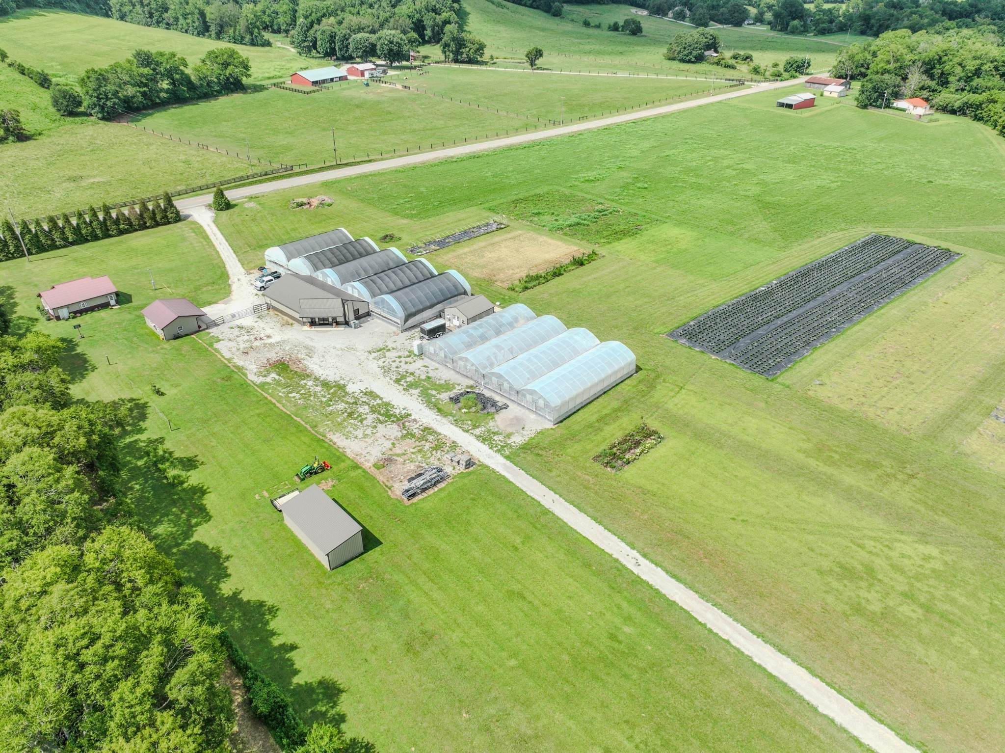 2461 Bodenham Road Pulaski, TN 38478 - Photo 34 of 59 a view of a table and chairs in the garden