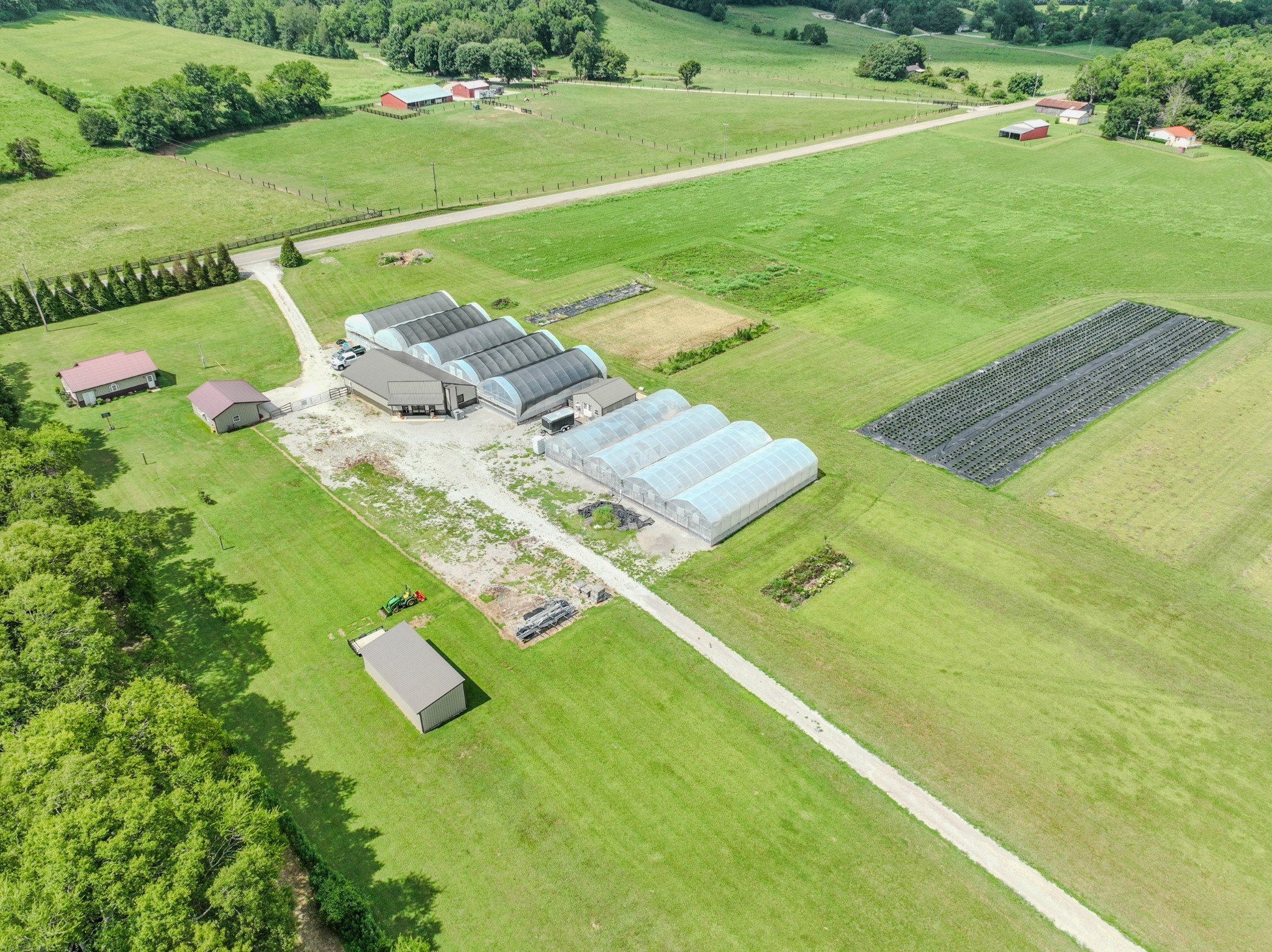 2461 Bodenham Road Pulaski, TN 38478 - Photo 35 of 59 a view of yard with swimming pool and outdoor seating