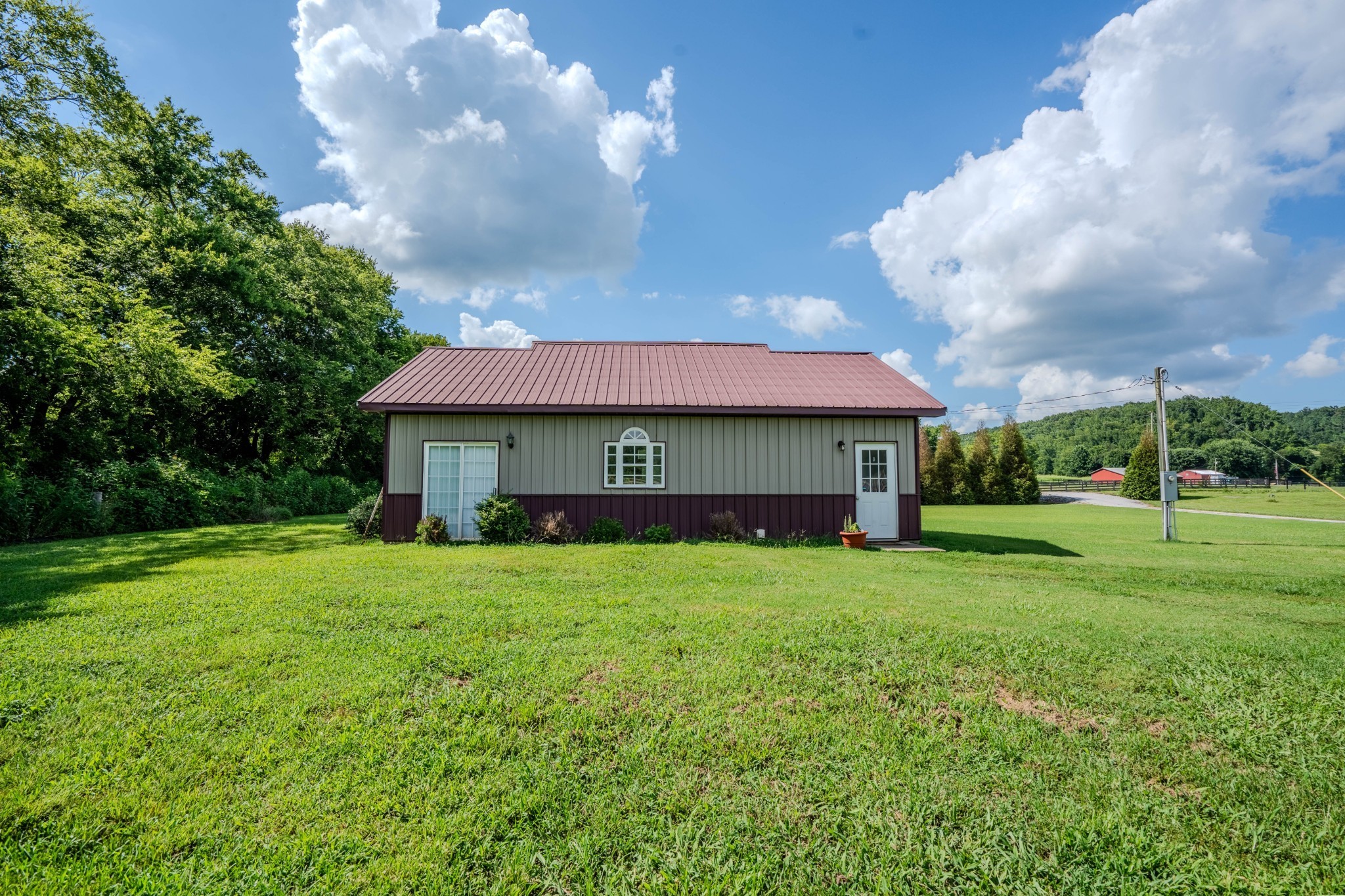 2461 Bodenham Road Pulaski, TN 38478 - Photo 48 of 59 a view of a house with a back yard