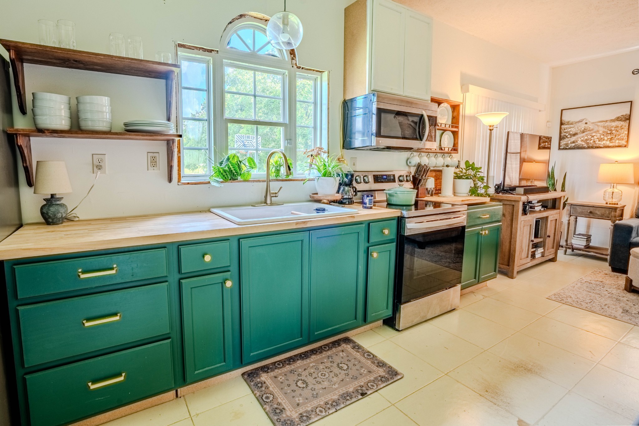 2461 Bodenham Road Pulaski, TN 38478 - Photo 50 of 59 a kitchen with a sink cabinets and window