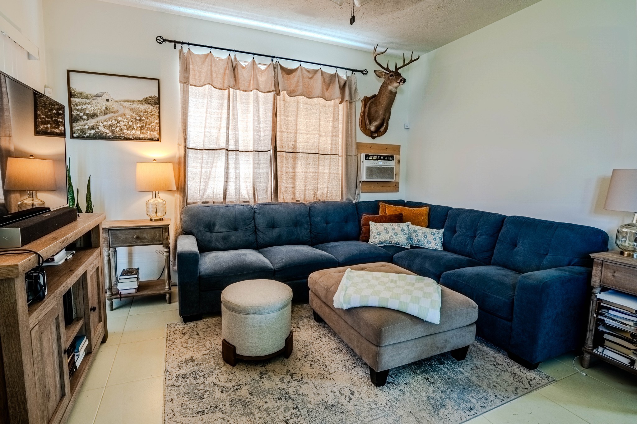 2461 Bodenham Road Pulaski, TN 38478 - Photo 52 of 59 a living room with furniture and a window