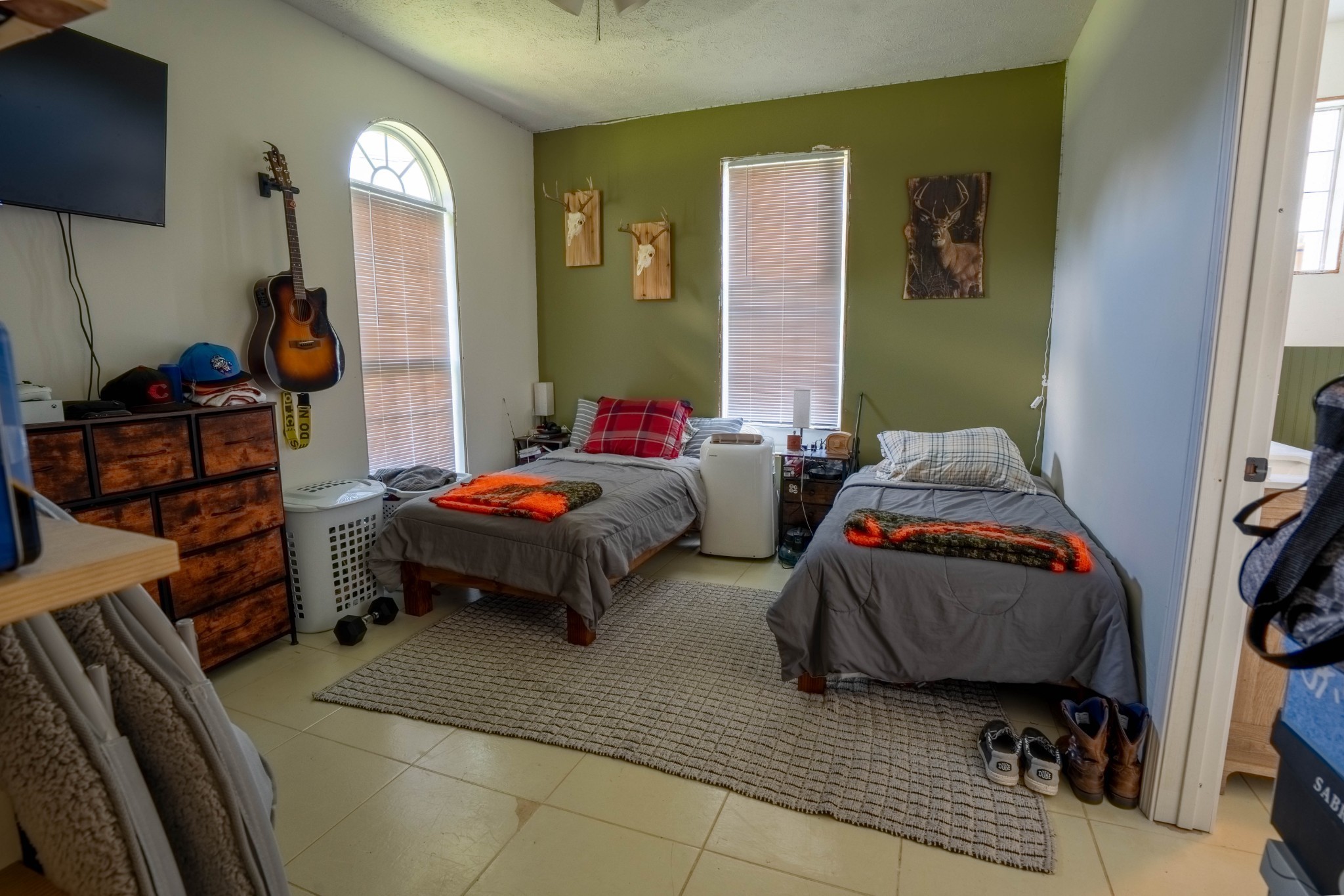 2461 Bodenham Road Pulaski, TN 38478 - Photo 56 of 59 a bedroom with two beds and a mirror