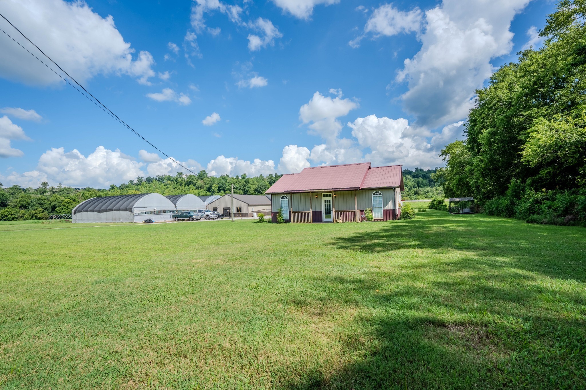 2461 Bodenham Road Pulaski, TN 38478 - Photo 57 of 59 a view of a house with a yard