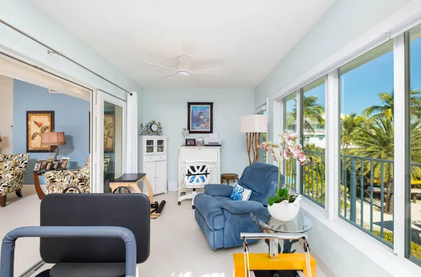 a bed room with a bed and a window