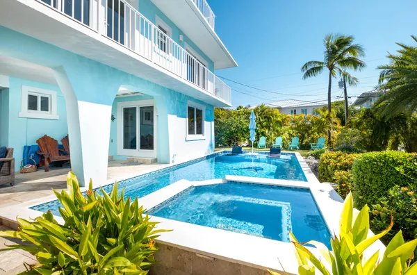 a view of a swimming pool with an outdoor space