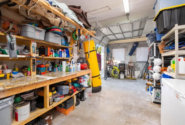 a view of a chairs and table in the patio