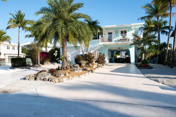 a view of a cafe with sitting area