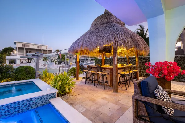 a view of house with outdoor seating space