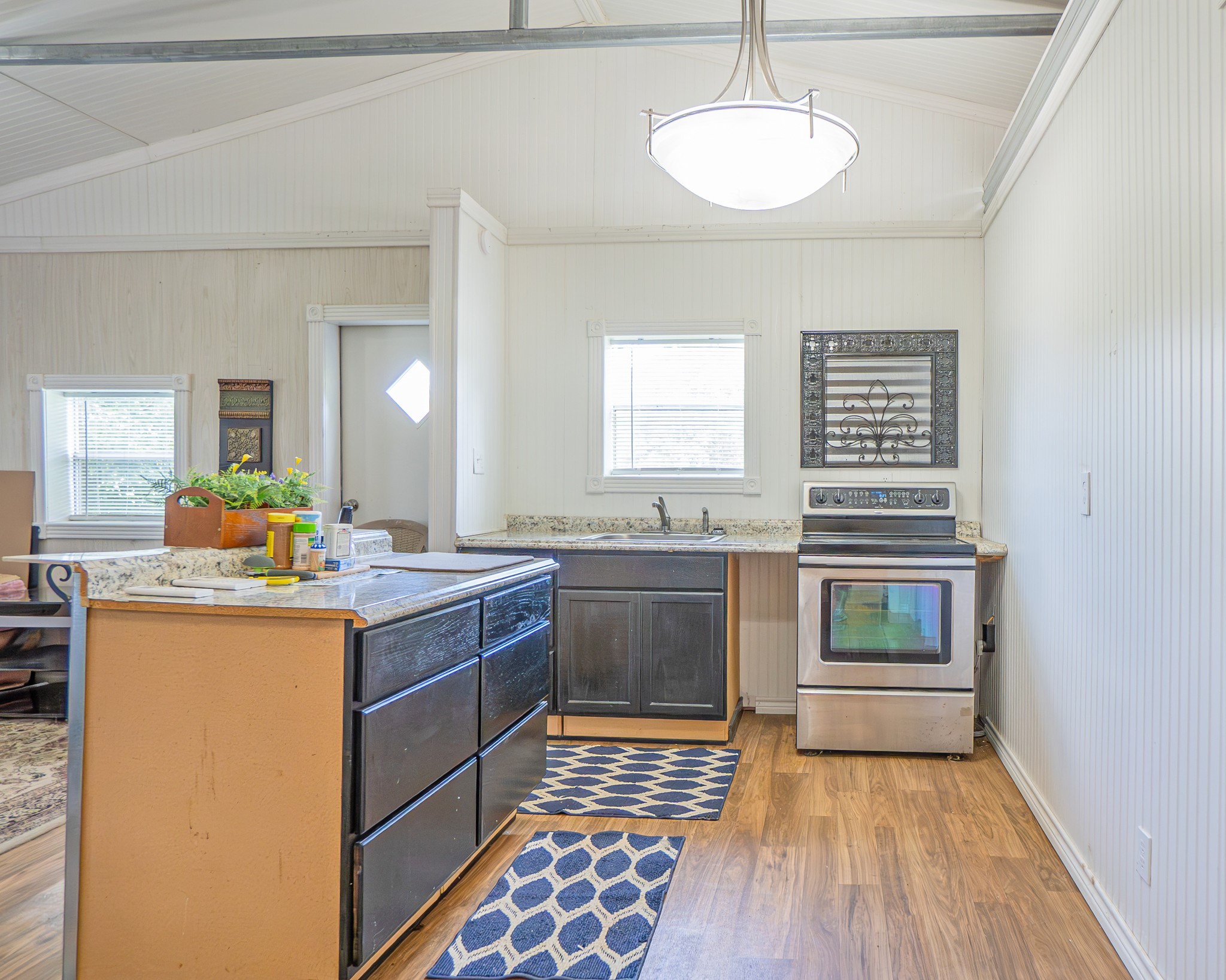 214 Williams Road Bay City, TX 77414 - Photo 14 of 48 a kitchen with a stove and a sink