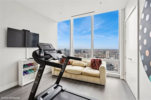 a bathroom with a toilet sink and shower