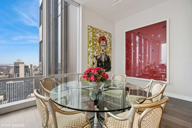 a spacious bedroom with a bed and a couch