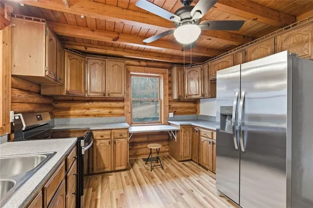 a view of entryway with wooden floor