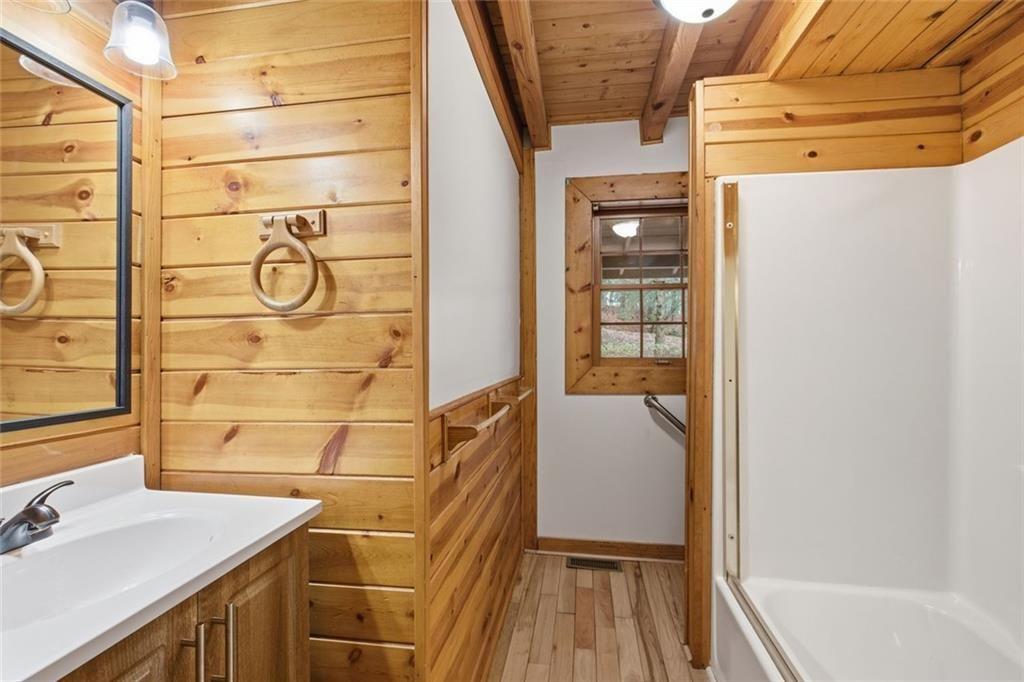 61 Bear Ridge Road Cleveland, GA 30528 - Photo 19 of 71 a bathroom with a sink and a shower