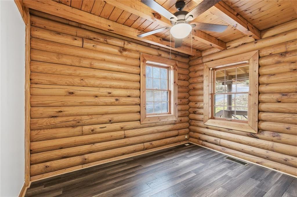61 Bear Ridge Road Cleveland, GA 30528 - Photo 21 of 71 a view of a room with stairs and a wooden floor