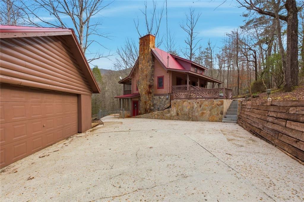 61 Bear Ridge Road Cleveland, GA 30528 - Photo 58 of 71 a house view with a outdoor space