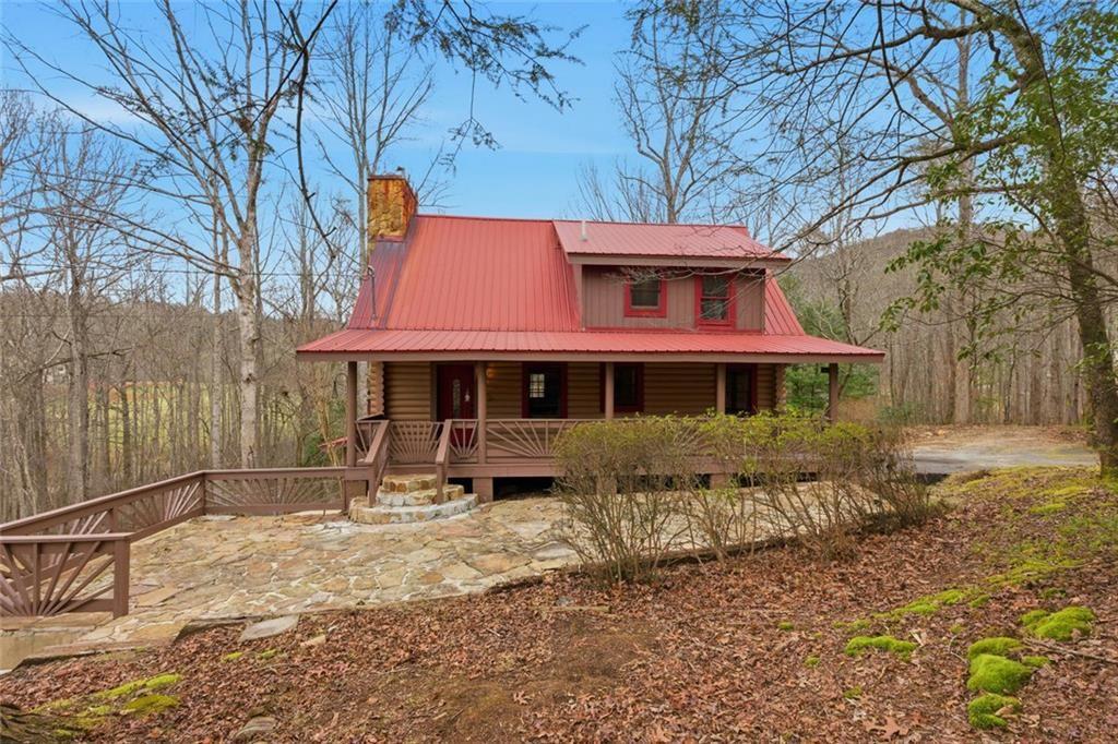 61 Bear Ridge Road Cleveland, GA 30528 - Photo 6 of 71 a front view of a house with a yard