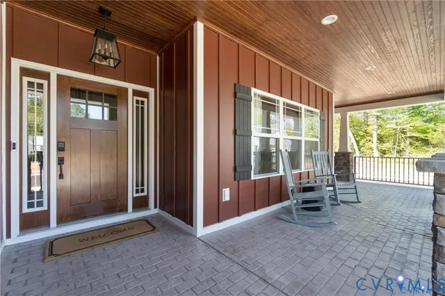 a view of work space with wooden floor and furniture