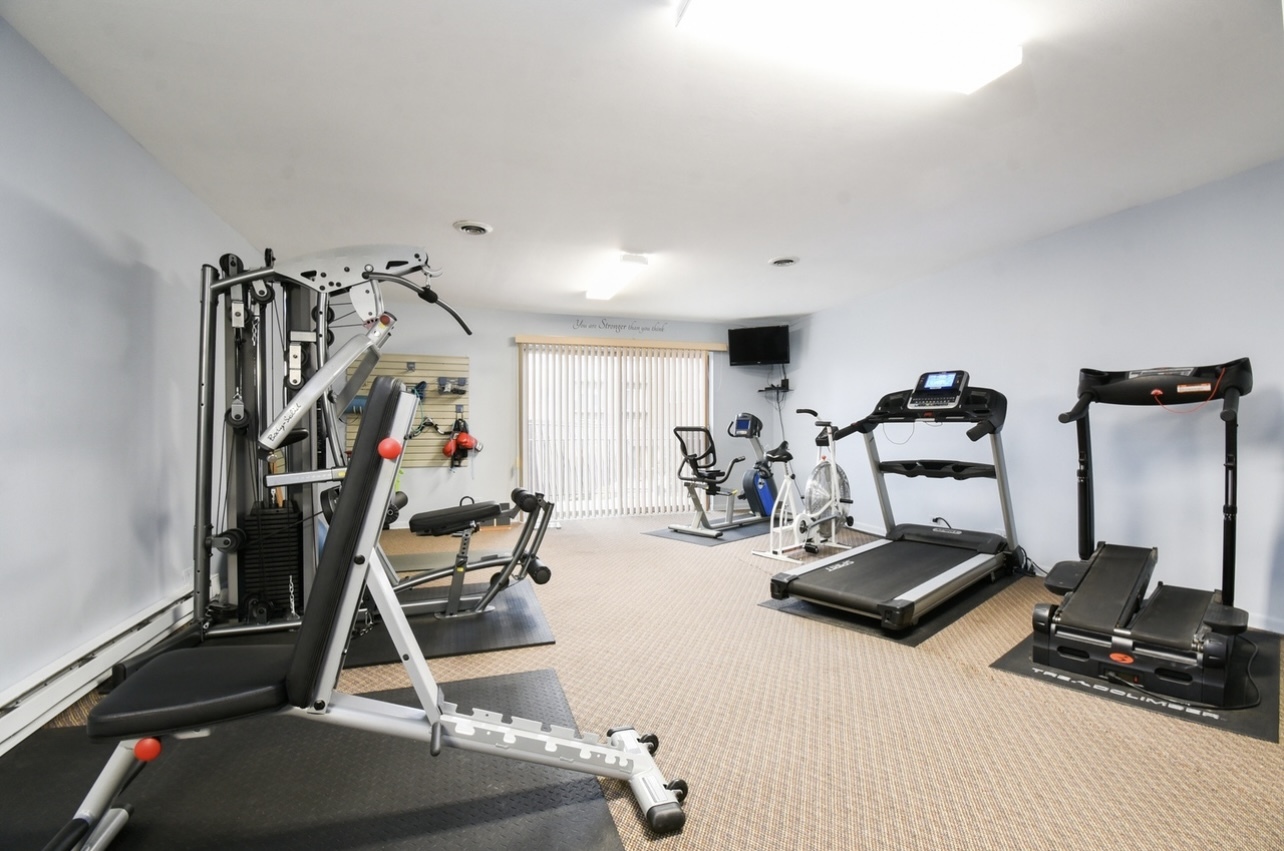 9820 South Pulaski Road, Unit 213 Oak Lawn, IL 60453 - Photo 17 of 18 a view of a room with gym equipment