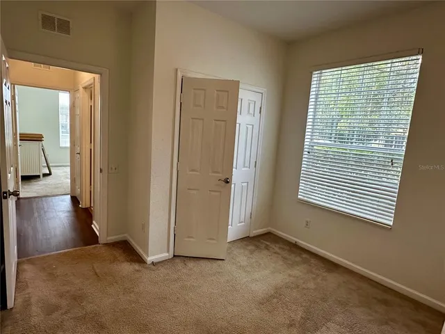 a view of livingroom with furniture and wooden floor