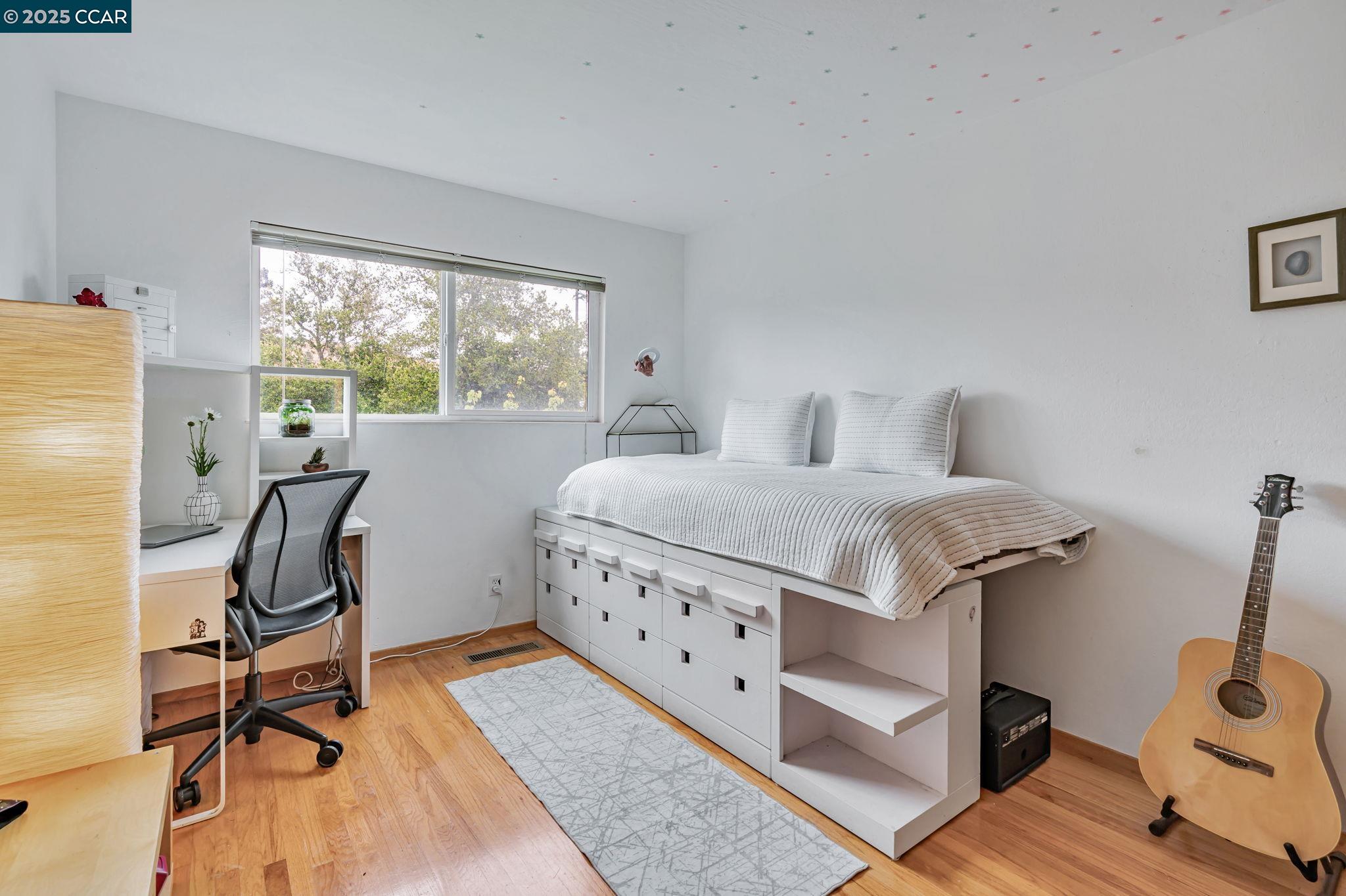 92 Gaywood Place Moraga, CA 94556 - Photo 18 of 52 a bedroom with furniture and a window
