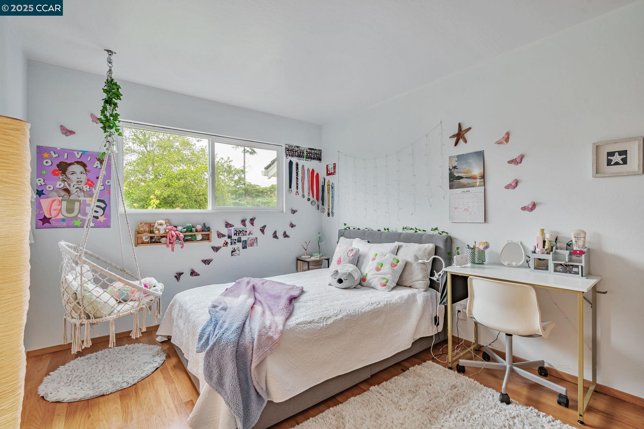 92 Gaywood Place Moraga, CA 94556 - Photo 19 of 52 a bedroom with a bed and a window