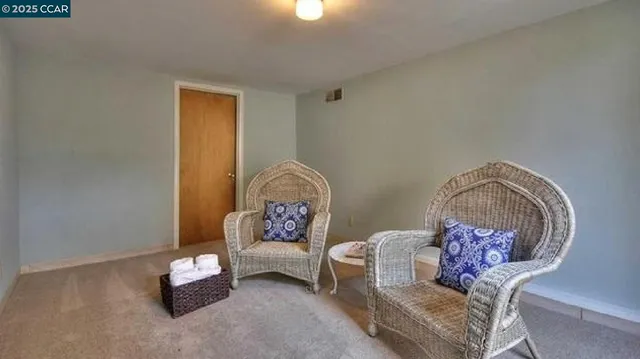 a view of a table and chairs in patio