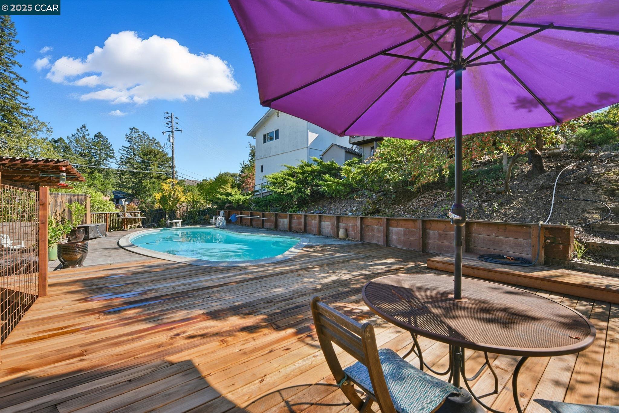 92 Gaywood Place Moraga, CA 94556 - Photo 32 of 52 a patio with a patio table and chairs