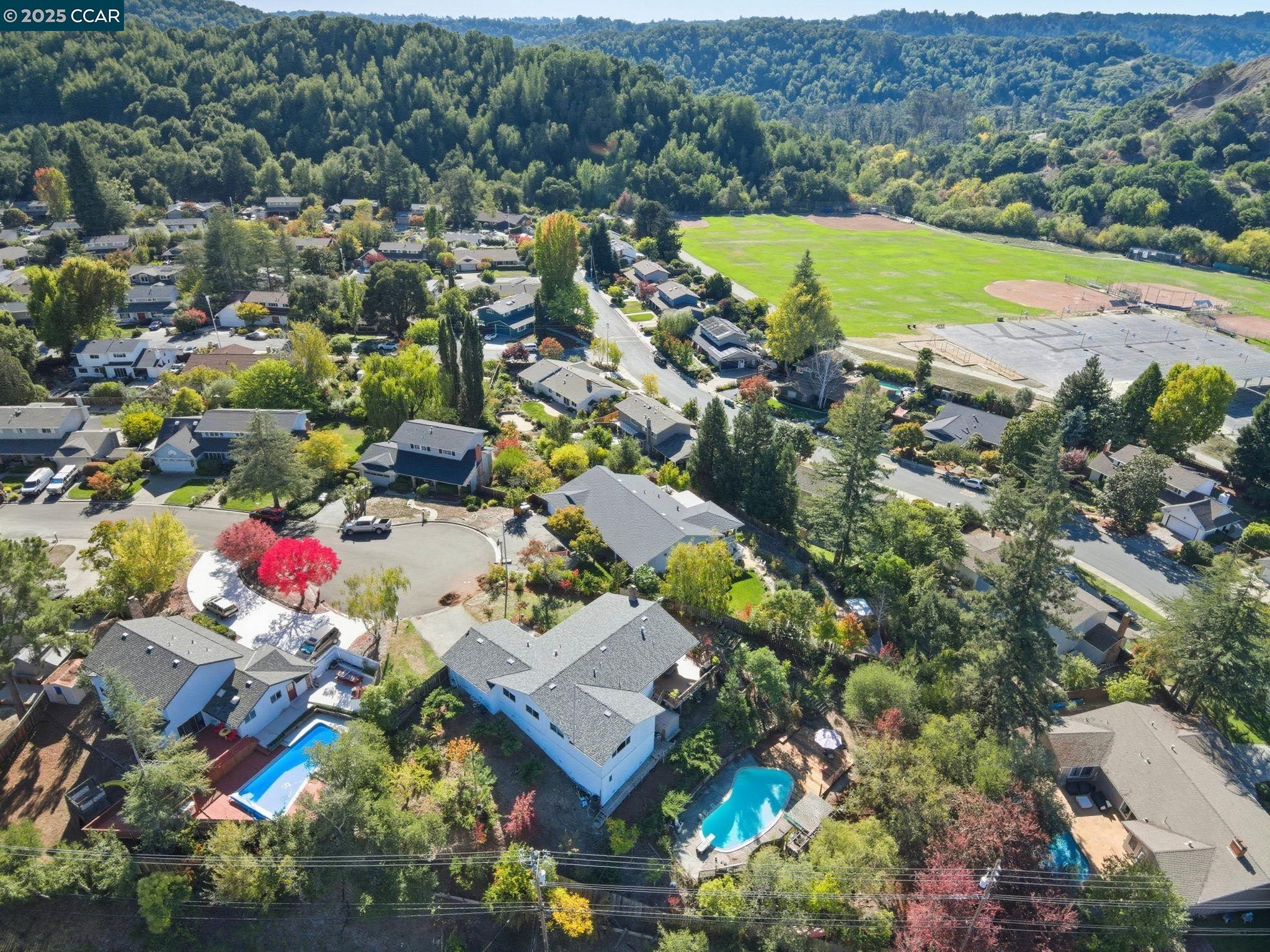 92 Gaywood Place Moraga, CA 94556 - Photo 41 of 52 an aerial view of residential houses with outdoor space and swimming pool