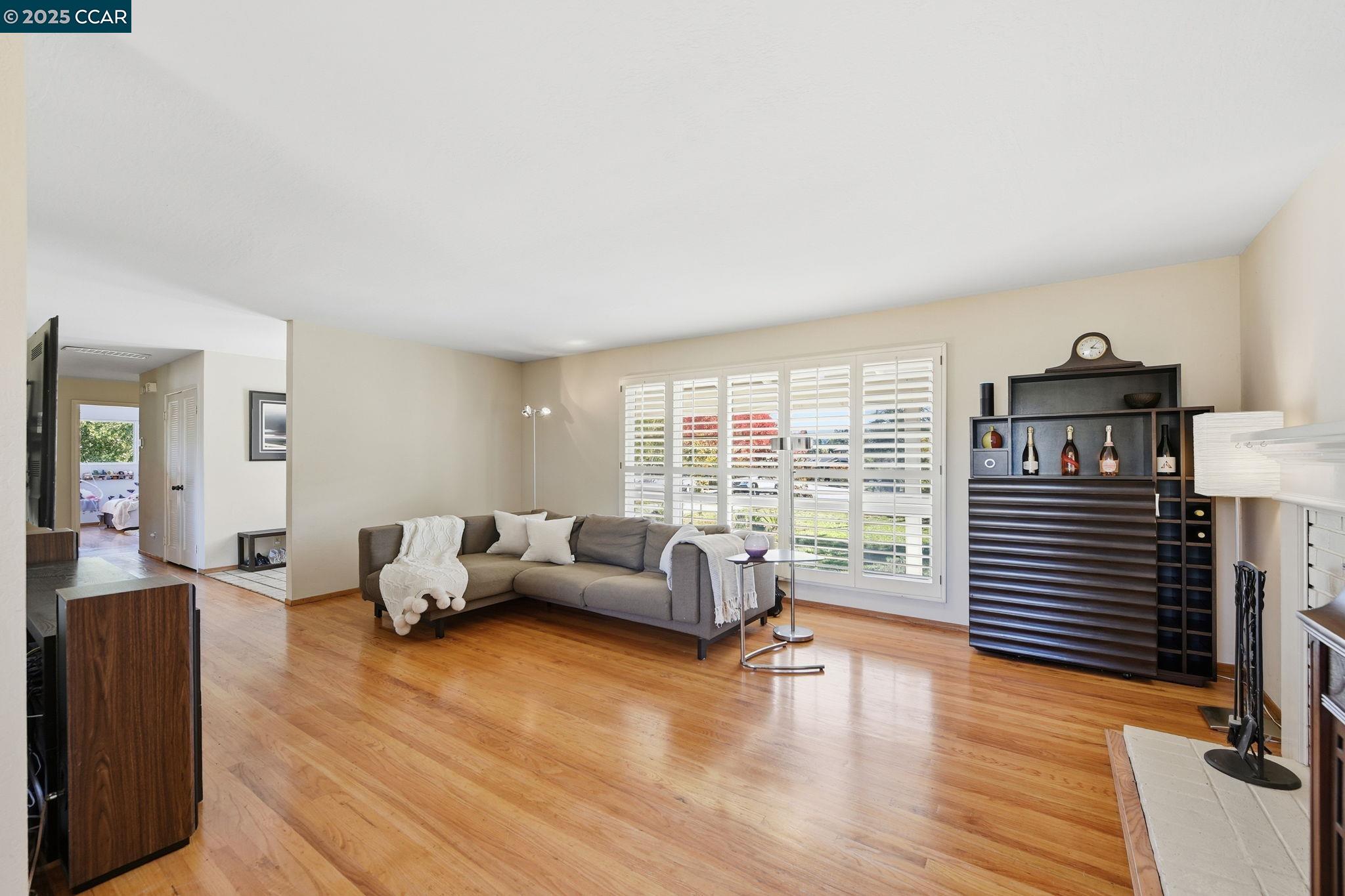 92 Gaywood Place Moraga, CA 94556 - Photo 5 of 52 a living room with furniture and wooden floor