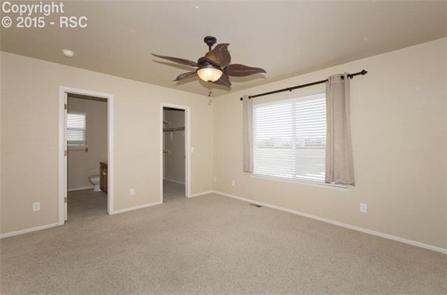 7571 Old Spec Road Peyton, CO 80831 - Photo 19 of 34 Master Bedroom, walk-in closet, 5 pc bathroom