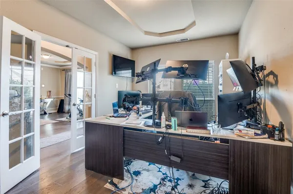a kitchen with stainless steel appliances kitchen island granite countertop a sink and cabinets