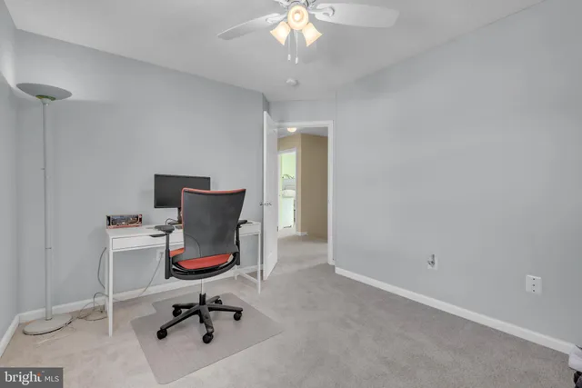 a bathroom with a sink a tub and a mirror
