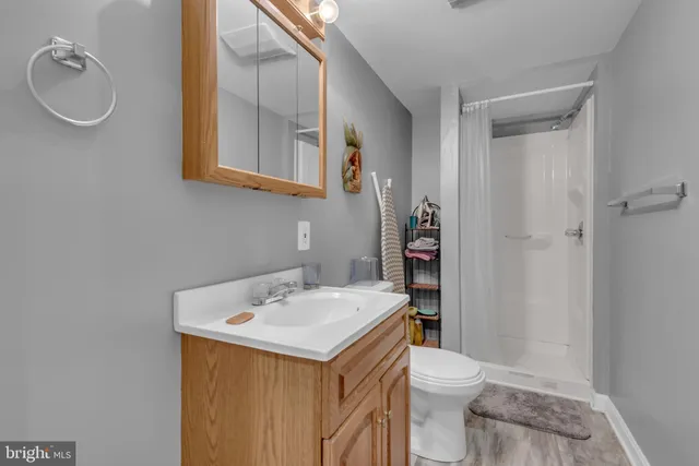 a view of backyard with a deck