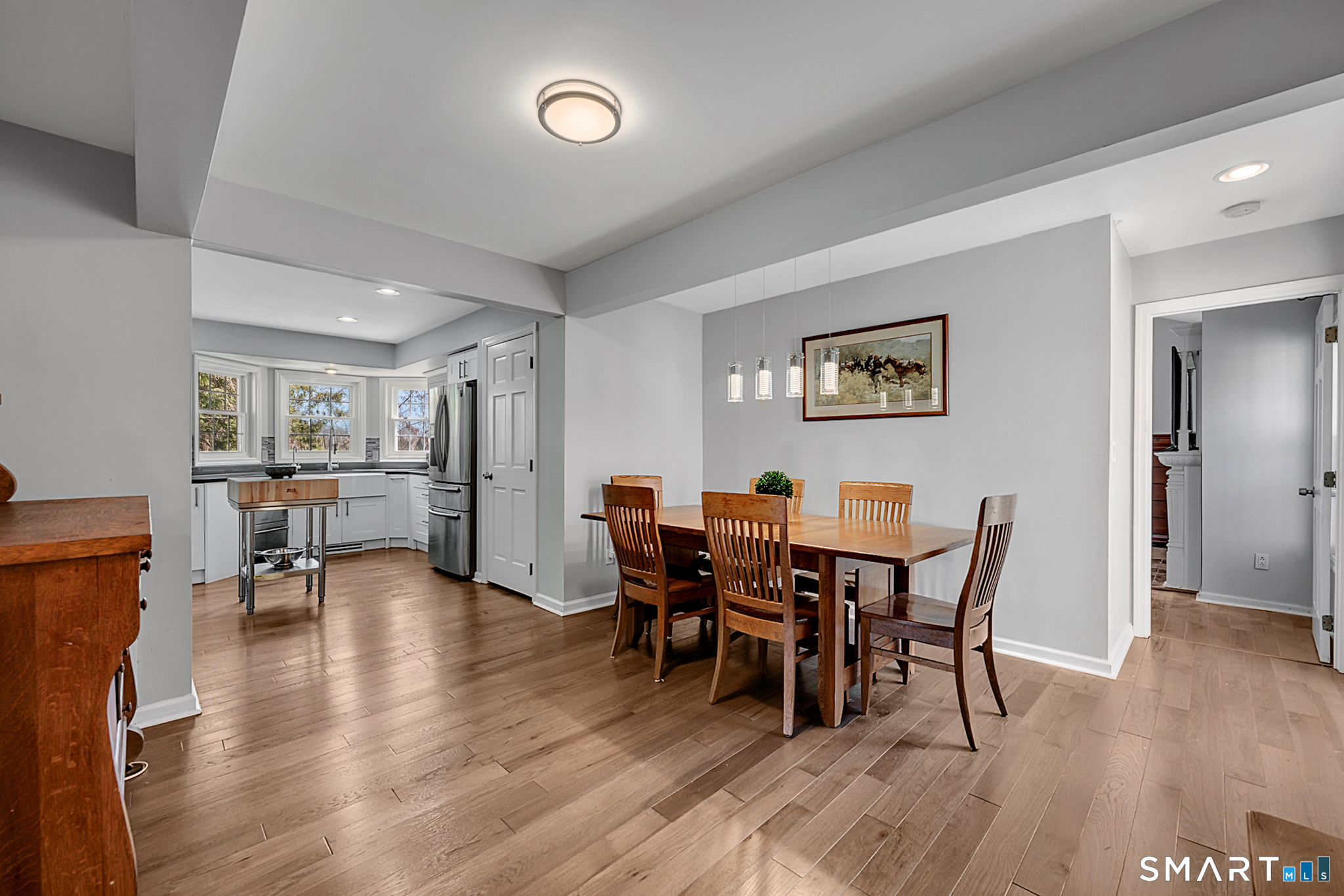 273 Osborne Hill Road Fairfield, CT 06824 - Photo 11 of 40 The Dining Room features hardwood floors and sliding glass doors leading directly to the deck.